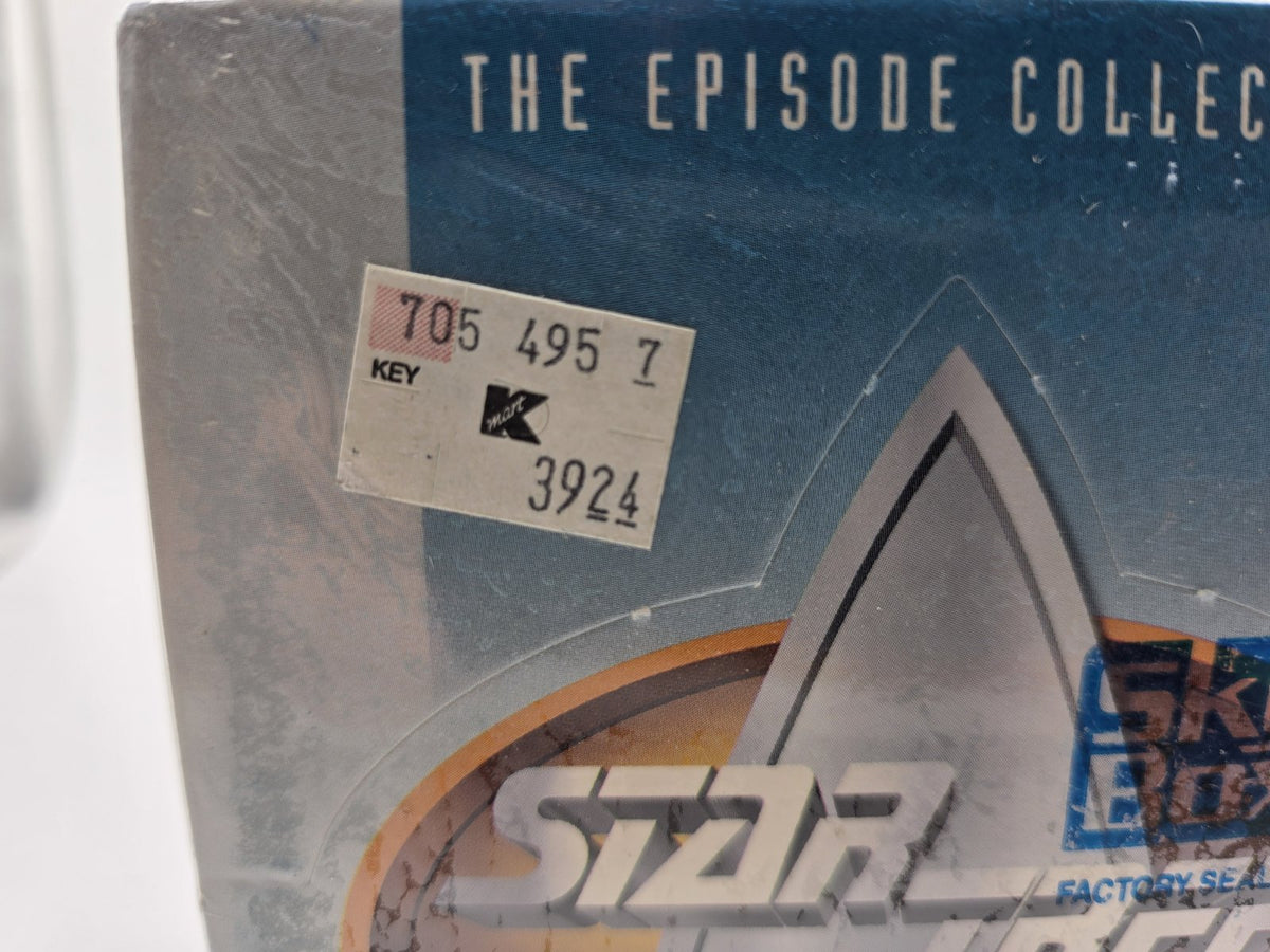 Close-up of original Kmart price sticker on the box